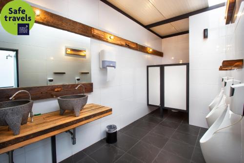 Een badkamer bij Hotel MX roma