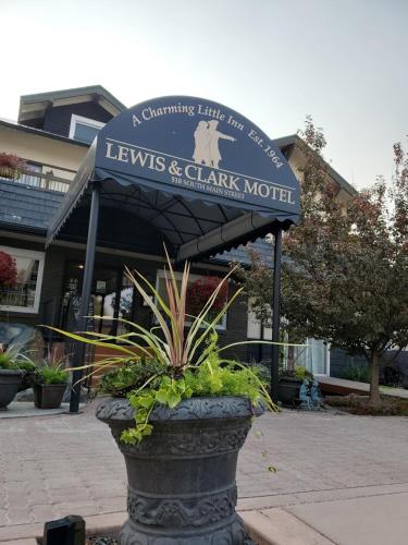 a sign for a lewis and clark motel at Three Forks Lewis & Clark Motel in Three Forks