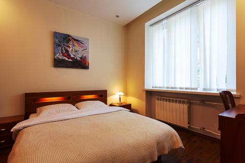 Кровать или кровати в номере Kyiv 2Rooms High Standard Apartment