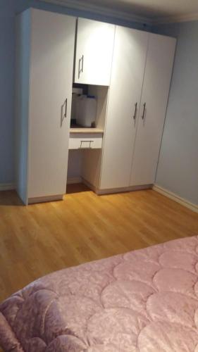 Ένα ή περισσότερα κρεβάτια σε δωμάτιο στο JB Countrylife Accommodation