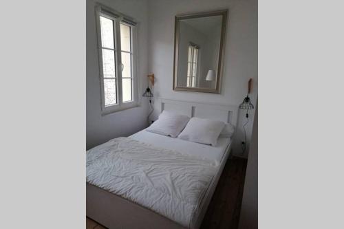 Postel nebo postele na pokoji v ubytování Maison zen et mer