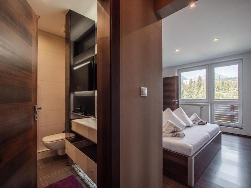 Posteľ alebo postele v izbe v ubytovaní Apartman Patris 33