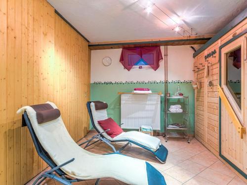 Телевизор и/или развлекательный центр в Geräumige Wohnung mit Grill