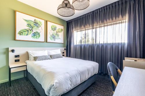 a bedroom with a bed and a window at Nightcap at Commercial Hotel in Gold Coast