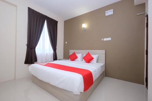 Katil atau katil-katil dalam bilik di Super OYO 43935 Mancalin Hotel