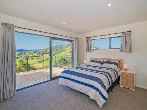 Postel nebo postele na pokoji v ubytování Peace and Paradise - Whitianga Holiday Home