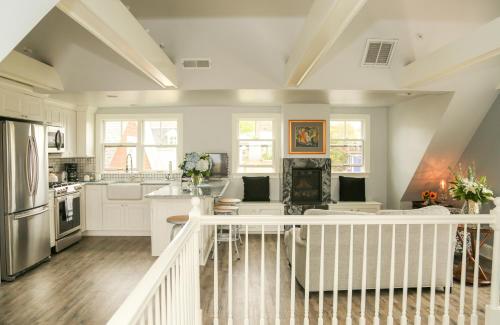 a kitchen with white cabinets and a white counter top at Almondy Inn Bed & Breakfast in Newport