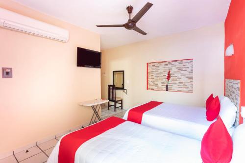 Postel nebo postele na pokoji v ubytování Hotel Costa Azul