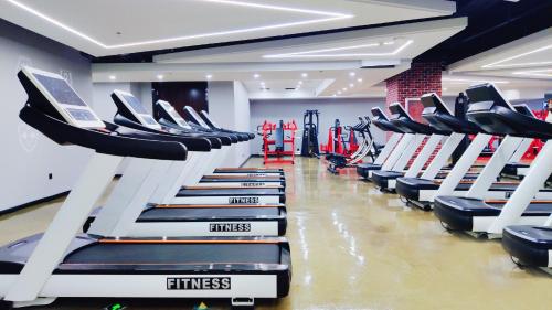 a row of seats in a gym with a row at Fulitai International Hotel in Yantai