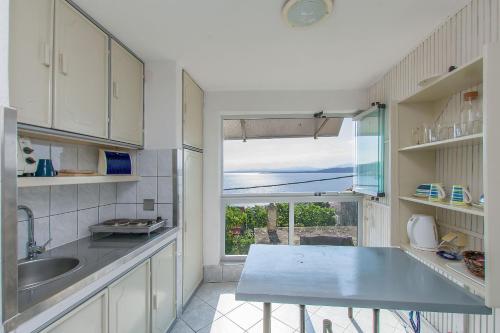 Kuchyň nebo kuchyňský kout v ubytování Apartments Sonja