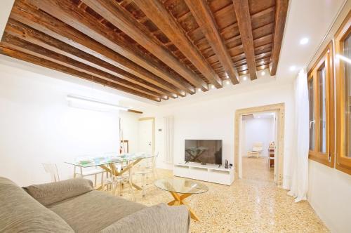 a living room with a couch and a table at DolceVita Apartments N. 479 in Venice