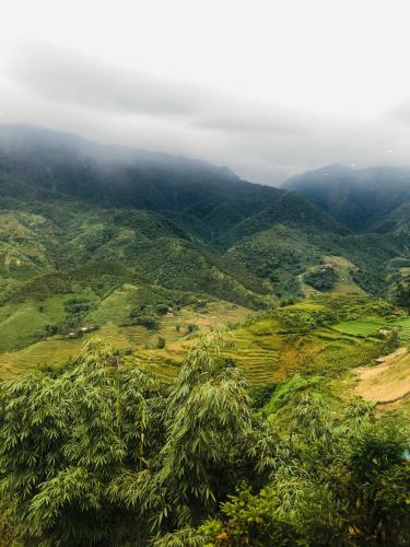 a view from the top of a mountain with trees at Sapa Valley view hotel in Sa Pa