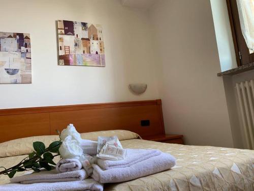 Ένα ή περισσότερα κρεβάτια σε δωμάτιο στο Casa Vacanze Orchidea