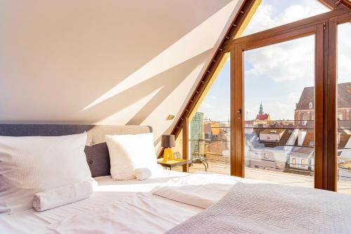 Posteľ alebo postele v izbe v ubytovaní Boogie Apartments