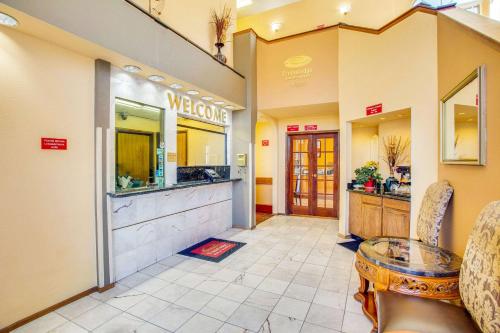 a lobby of a mexican restaurant with a table at Econo Lodge Inn & Suites Albuquerque East I-40 Eubank Exit in Albuquerque