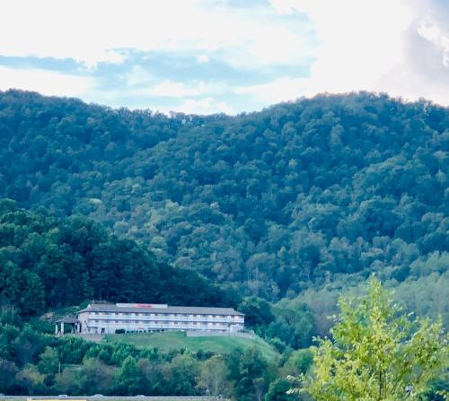 a large building in the middle of a mountain at Econo Lodge Waynesville in Waynesville