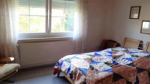 Postel nebo postele na pokoji v ubytování Ferienwohnung Heidlinger