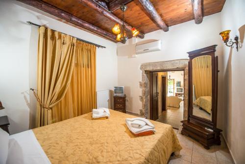 Ένα ή περισσότερα κρεβάτια σε δωμάτιο στο Villa Faye