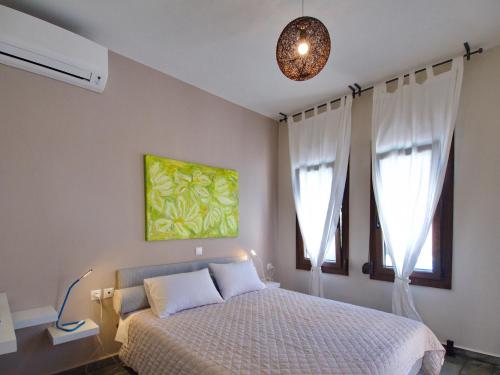 Кровать или кровати в номере Villa Minetti