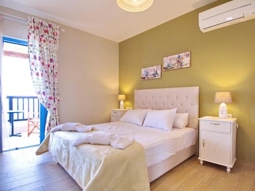 Posteľ alebo postele v izbe v ubytovaní Villa Odysseus Spartia Kefalonia