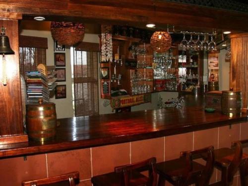 Ο χώρος του lounge ή του μπαρ στο Monacco Guest house