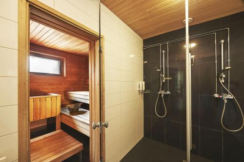 a bathroom with a shower and a sink at Holiday Inn Helsinki-Vantaa Airport, an IHG Hotel in Vantaa