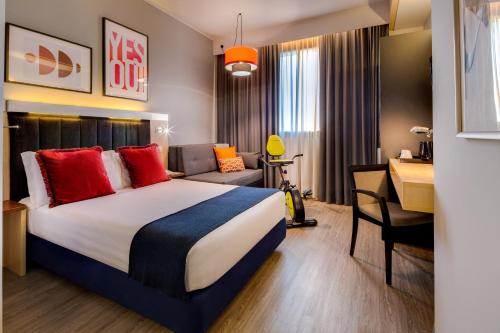 Posteľ alebo postele v izbe v ubytovaní Holiday Inn Bologna - Fiera by IHG