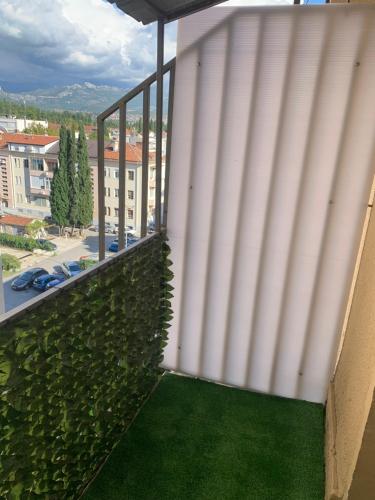 Un balcón o terraza de Apartman Daca