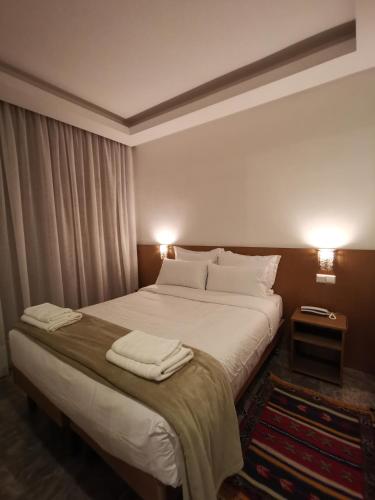 Casa City Break Appart hôtelにあるベッド