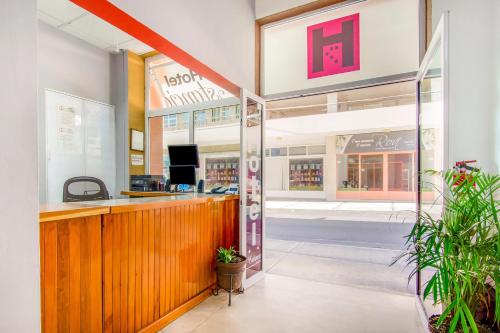 a store front with a counter in a store at Hotel La Estancia in Colima