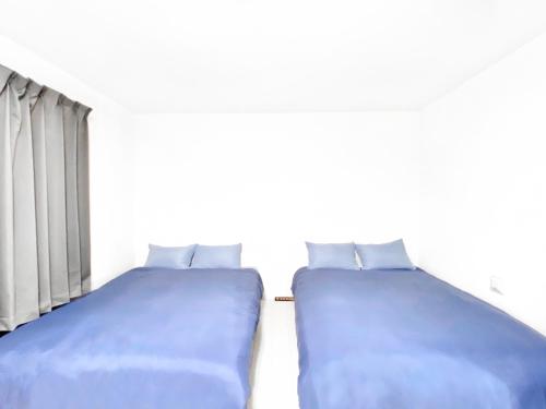 Кровать или кровати в номере FL Residence Takadababa - Vacation STAY 9582