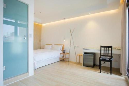 Кровать или кровати в номере Mini West Hotel