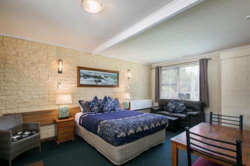 Postel nebo postele na pokoji v ubytování Allamar Motel