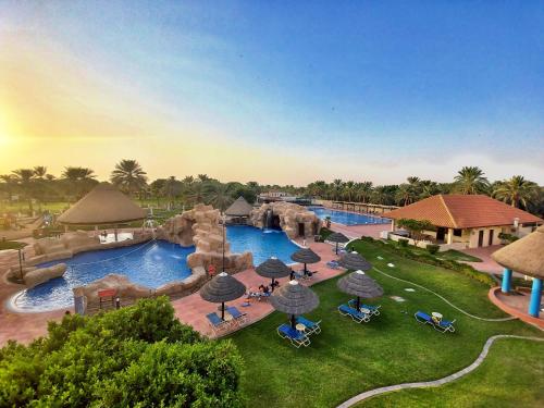 an aerial view of a pool at a resort at Danat Al Ain Resort in Al Ain