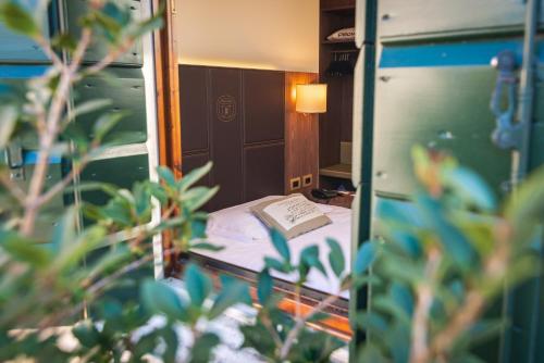 Postel nebo postele na pokoji v ubytování Hotel Alla Torre