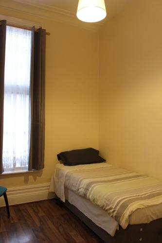 Postel nebo postele na pokoji v ubytování Grafton House