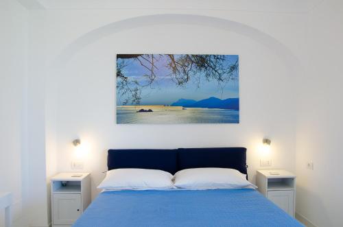 מיטה או מיטות בחדר ב-Villa Idris