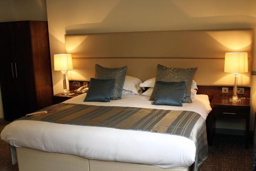 Cama o camas de una habitación en The Legacy Rose & Crown Hotel