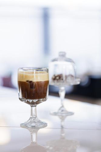 two glasses of coffee sitting on a table at Jo An Palace in Rethymno Town
