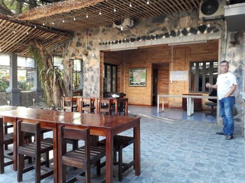 Restaurant ou autre lieu de restauration dans l'établissement Ha Giang Creekside Homestay and Tours