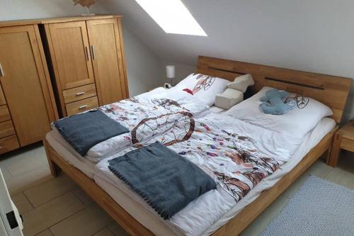 En eller flere senge i et værelse på Fewo NordSee'n Sucht