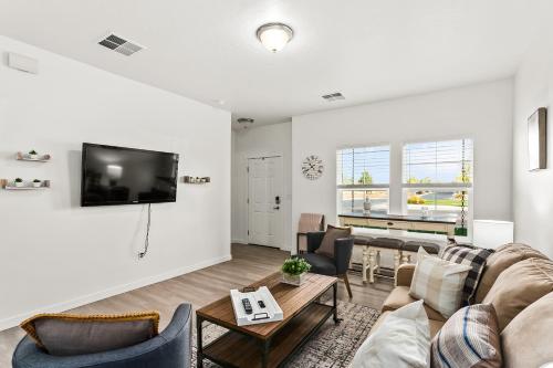 a living room with a couch and a table at Gabrielle Townhomes in Boise