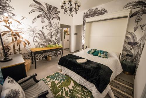 Postel nebo postele na pokoji v ubytování La Cles Deluxe Suites