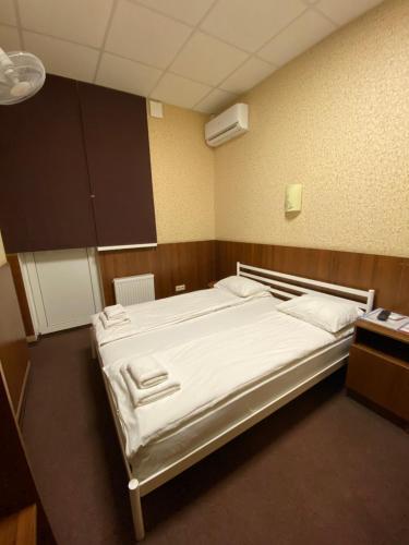 Postel nebo postele na pokoji v ubytování irisHotels