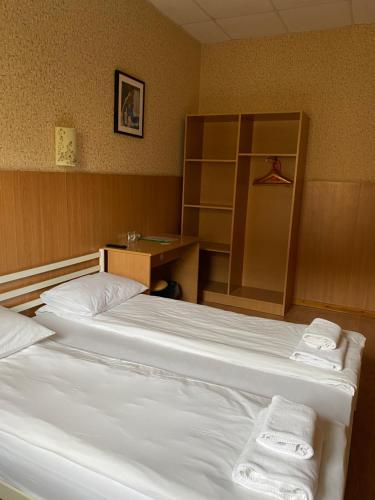 Postel nebo postele na pokoji v ubytování irisHotels