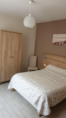 Ένα ή περισσότερα κρεβάτια σε δωμάτιο στο Mistral Appartements