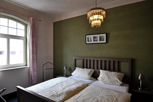 מיטה או מיטות בחדר ב-Hotel Reuter