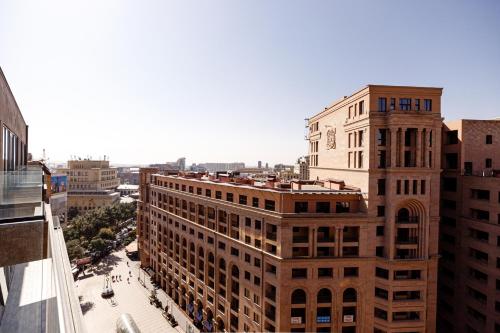 an overhead view of a city with tall buildings at Hilltop North Avenue by Stellar Hotels, Yerevan in Yerevan