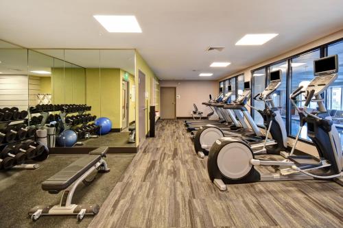 a gym with treadmills and cardio machines at Holiday Inn Lancaster by IHG in Lancaster