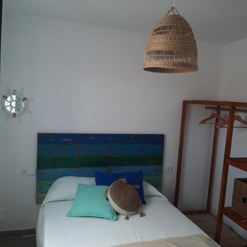 Ένα ή περισσότερα κρεβάτια σε δωμάτιο στο Apartamento La Maresía 2